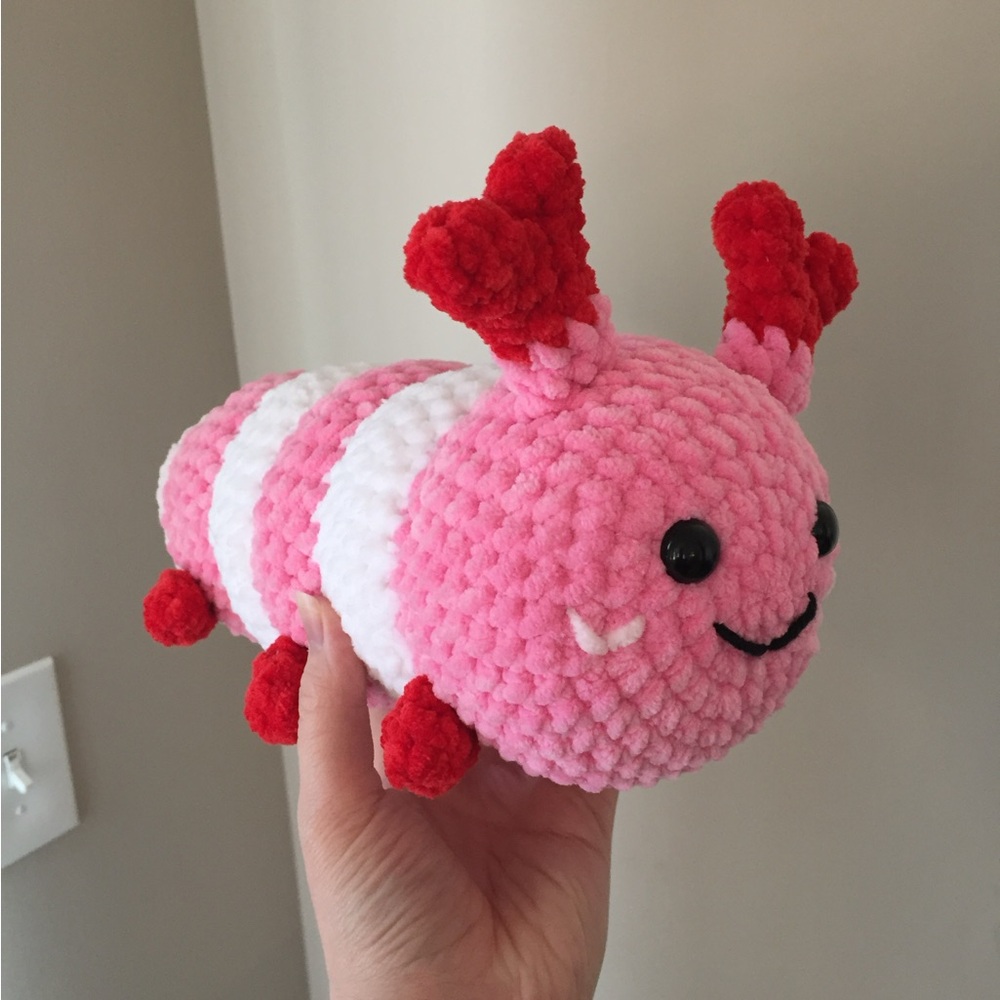 Handmade crochet Valentine’s Day caterpillar plushie